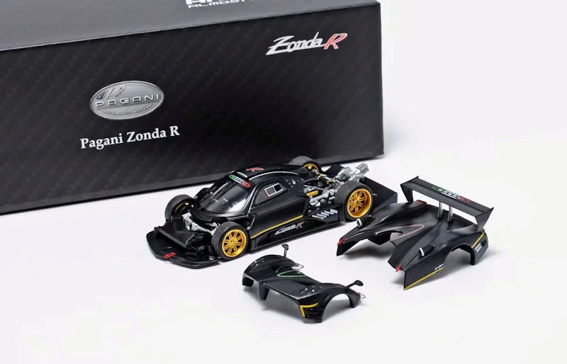 Pagani Zonda R scale model car kit with a black body, gold wheels, and matching rear wing and front splitter parts, by Almost Real & Motorhelix 