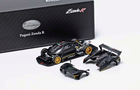 Pagani Zonda R scale model car kit with a black body, gold wheels, and matching rear wing and front splitter parts, by Almost Real & Motorhelix 