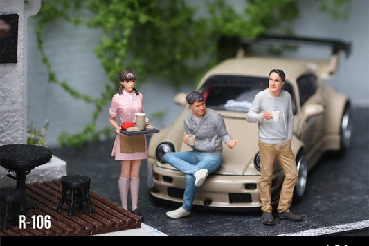 Moreart R-106 Café Break Mini Figure Set in 1:64 scale, featuring three miniature human figures posed around a beige sports car on a street scene backdrop with cafe details.