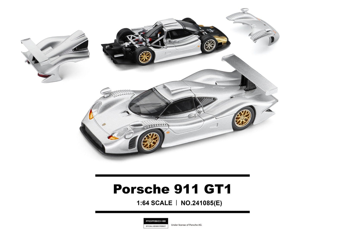 Trends Hobby 1:64 scale model of the Porsche 911 GT1, shown in a silver and black livery with gold wheels, alongside its disassembled body parts on a white background.