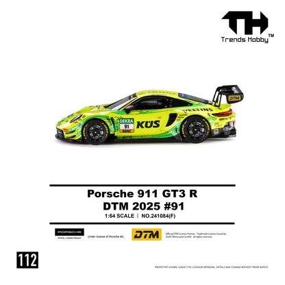 A 1:64 scale model of the Porsche 911 GT3 R race car from DTM 2025, shown in a green and yellow livery with KUS and Trends Hobby branding. The image features a clean white background with product details and branding text below the car.